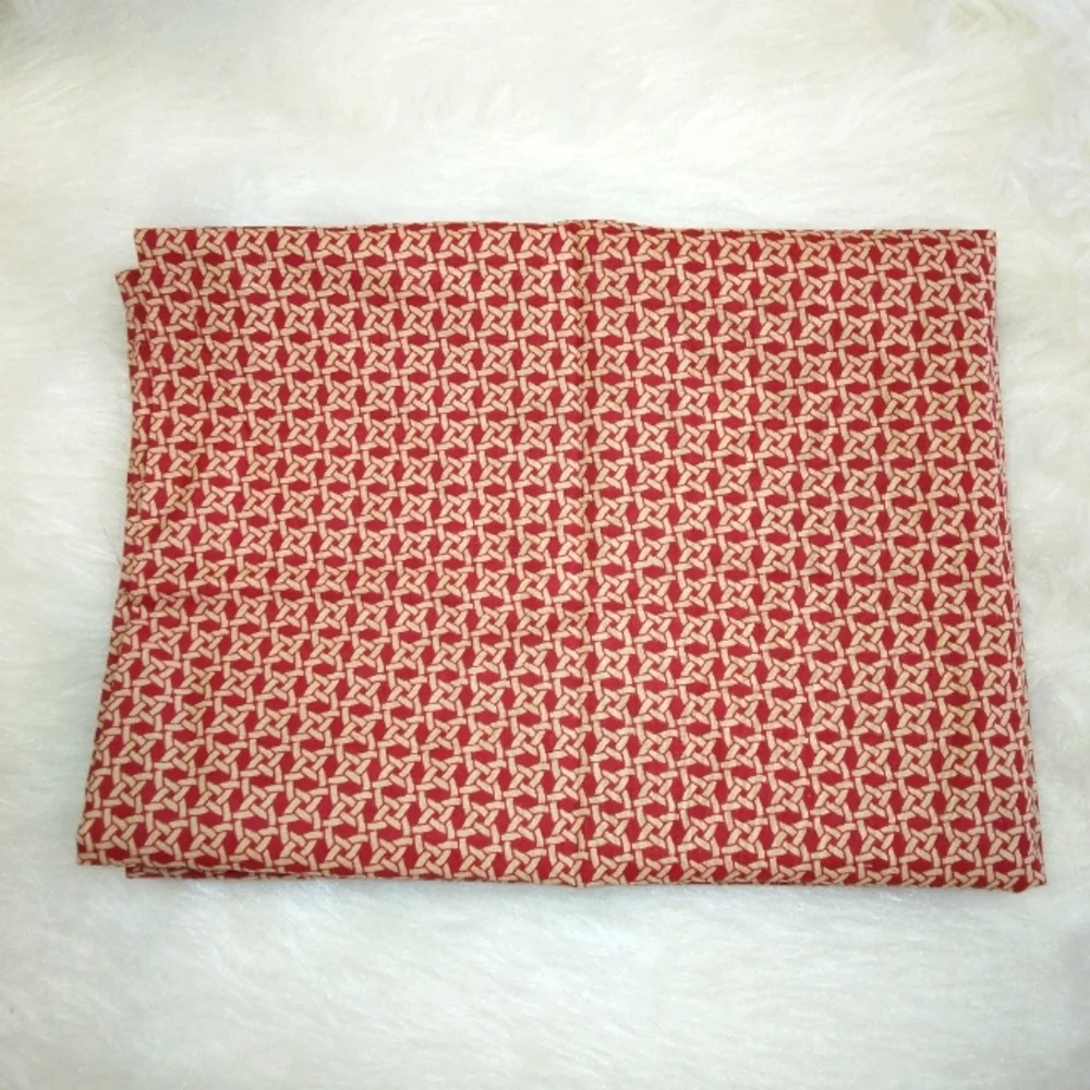 FABRIC Rattan woven look print on Maroon background, cotton. 32 inches